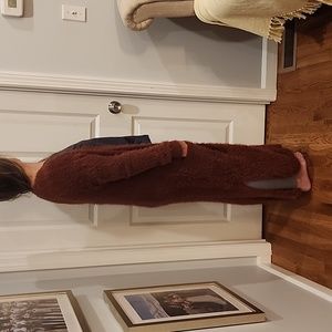 Cardigan. Maroon/reddish purple.